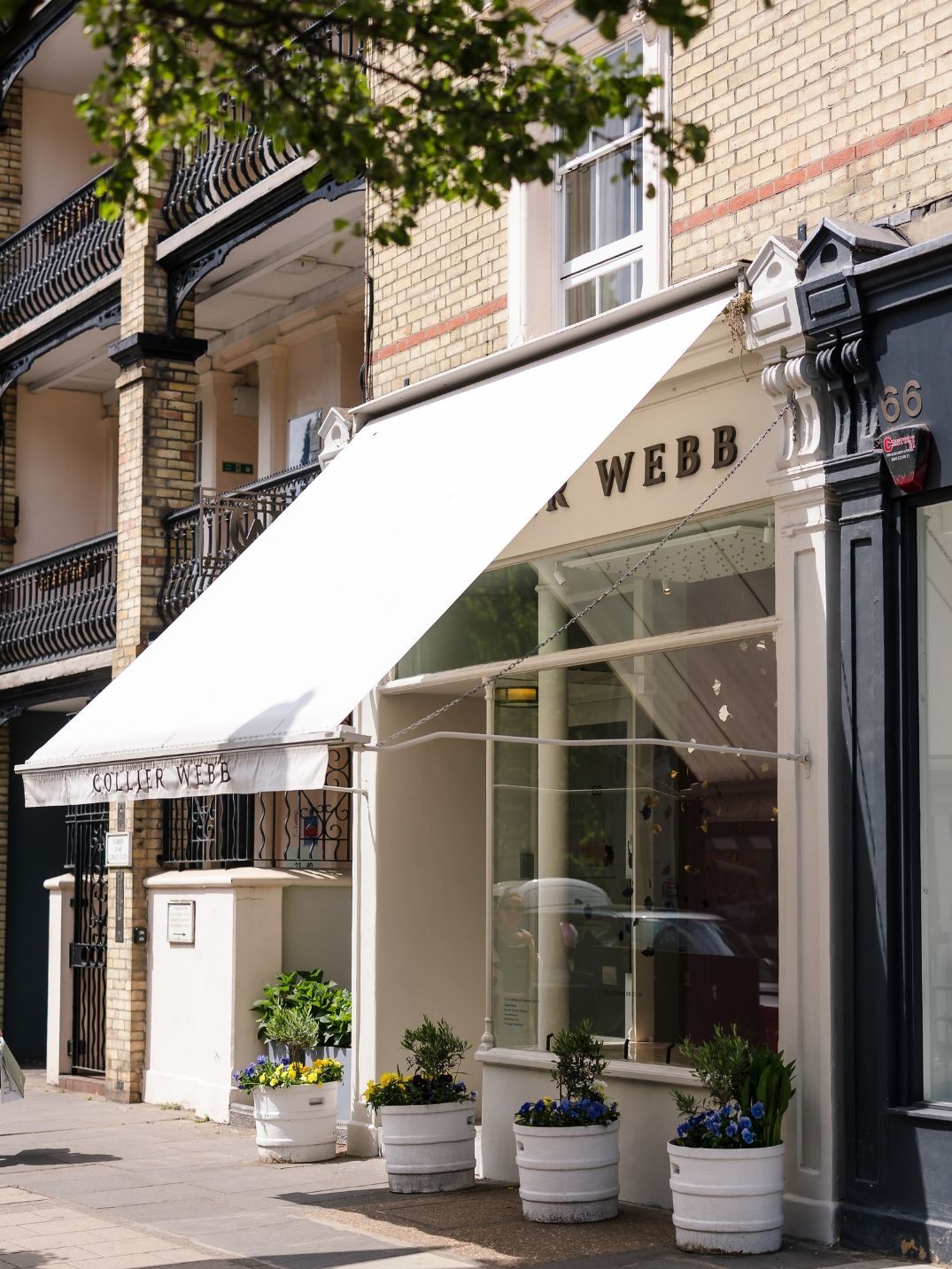 Brass & Bloom: Collier Webb’s Summer Window Display